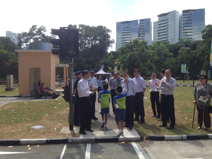 New Active Mobility Advisory Panel talking to students from North Spring Primary School at the Road Safety Community Park as the children learn about road safety.  Photo: Holly Matthews/TODAY