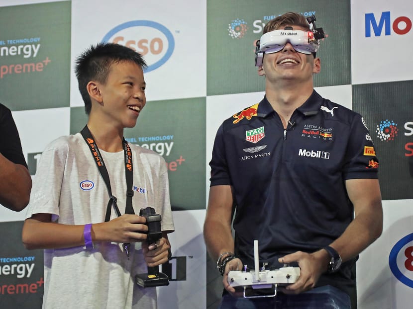 Photo of the day: Belgian-Dutch F1 racing driver Max Verstappen at *SCAPE on Wedneday (Sept 12), where he took part in Esso and Mobil 1's Supreme Showdown, a hybrid drone and remote-controlled car race with 13-year-old drone racer Dzeroun Choong. Verstappen also tried his hand at drone flying in the specially built circuit.