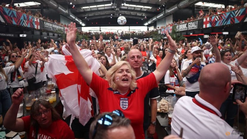 Red and white England fans gather in London for Women's Euro final Red and white England fans gather in London for Women's Euro final