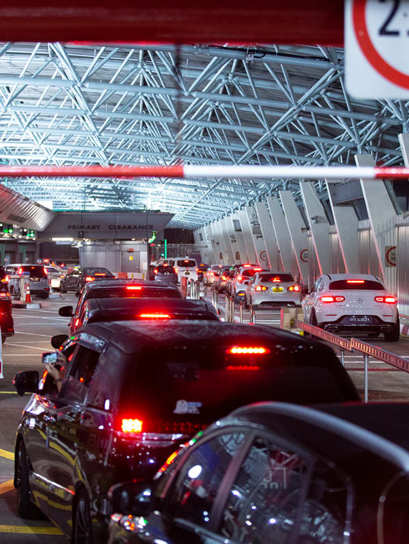 Vehicles line up at the Woodlands Checkpoint enroute to Malaysia on April 1, 2022. 
