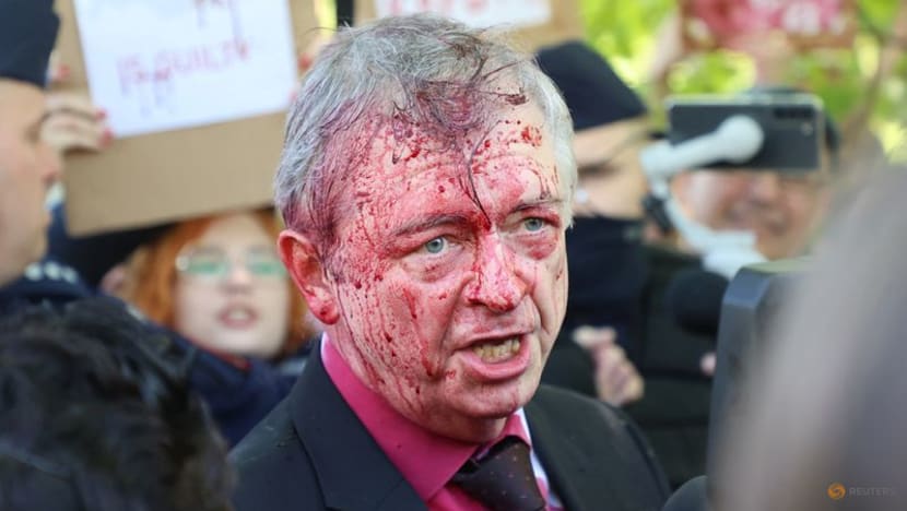 Russian envoy to Poland doused in red by anti-war protesters Russian envoy to Poland doused in red by anti-war protesters