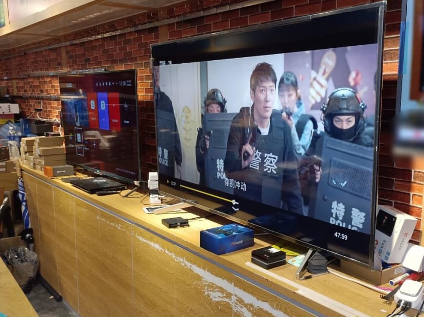 The police conducted a raid on several retail shops selling illegal streaming devices (pictured) at Sim Lim Square shopping centre on Oct 4, 2022.