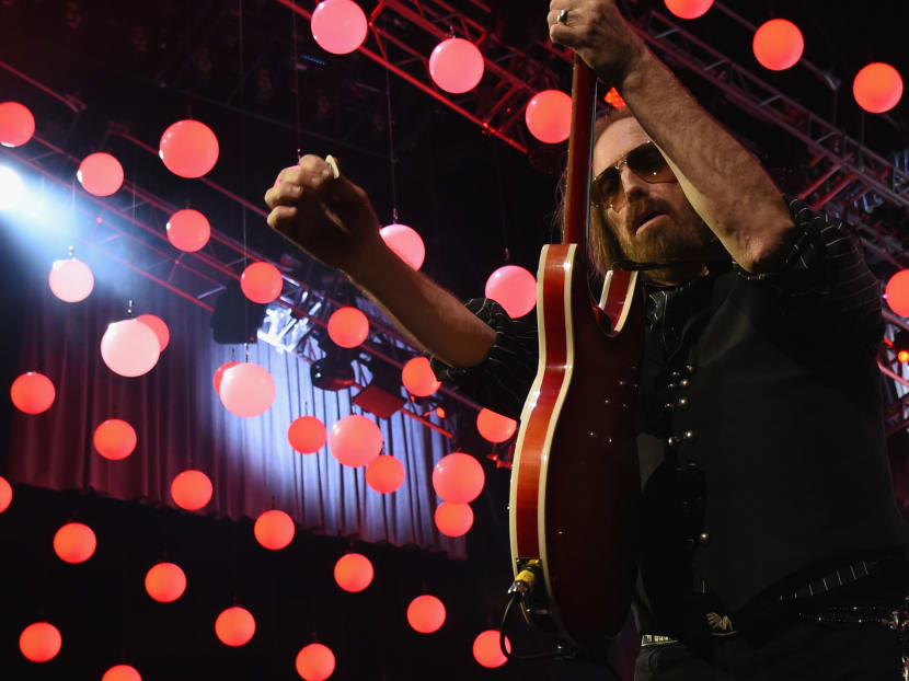 This file photo taken on April 25, 2017 shows Tom Petty of Tom Petty and the Heartbreakers performing during their 40th Anniversary Tour at Bridgestone Arena in Nashville, Tennessee. Rocker Tom Petty died Monday at 66 after suffering cardiac arrest, his family confirmed, hours after news organizations retracted unconfirmed reports of his death. Photo: AFP