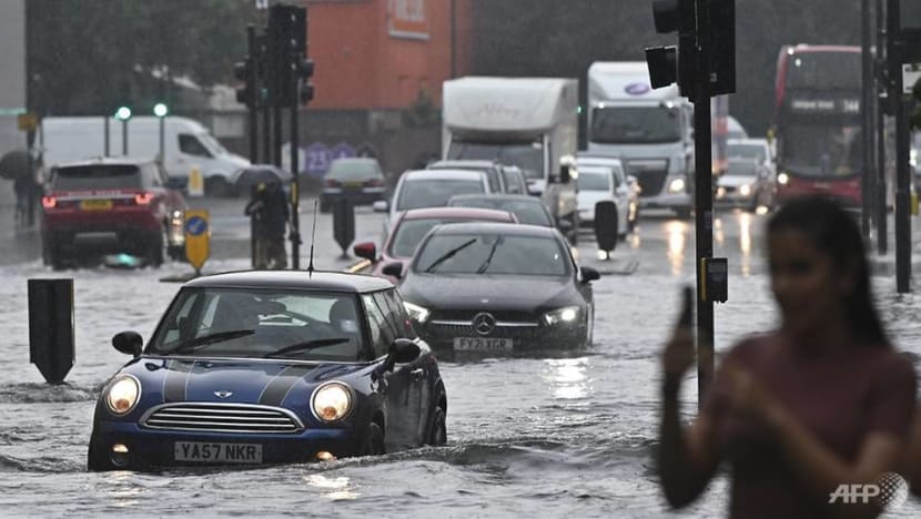 London cleans up after flash flooding drenches homes, subway London cleans up after flash flooding drenches homes, subway