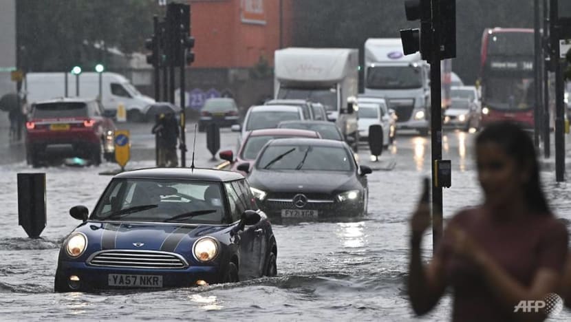 London cleans up after flash flooding drenches homes, subway