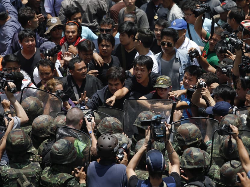 Hundreds defy Thai junta warning against protests