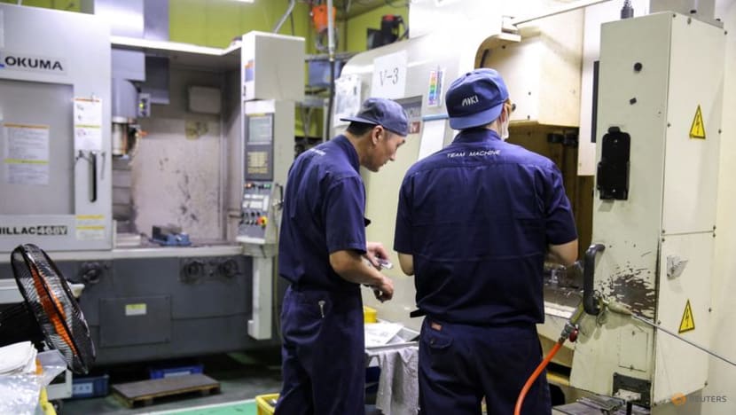 Japan's October factory output falls again on global slowdown, weak chip demand