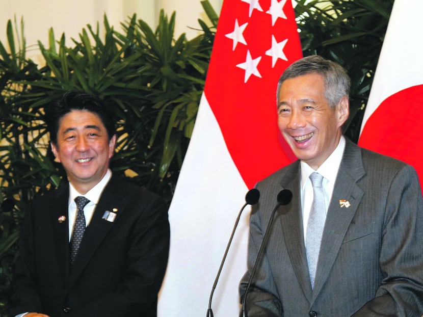 Prime Minister of Japan Shinzo Abe with Singapore Prime Minister Lee Hsien Loong on July 26, 2013. Photo: Ernest Chua
