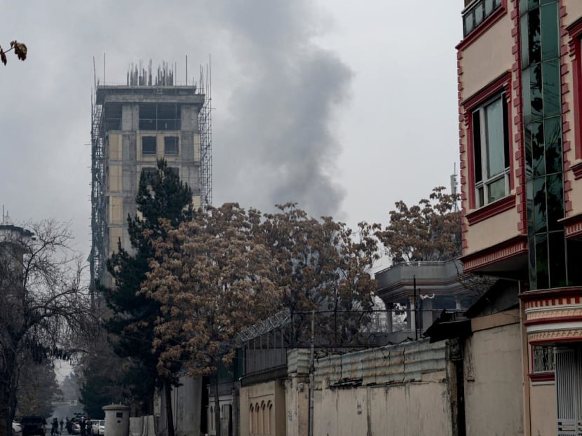 Smoke rises from a site of an attack at Shahr-e-naw which is city's one of main commercial areas in Kabul on Dec 12, 2022.