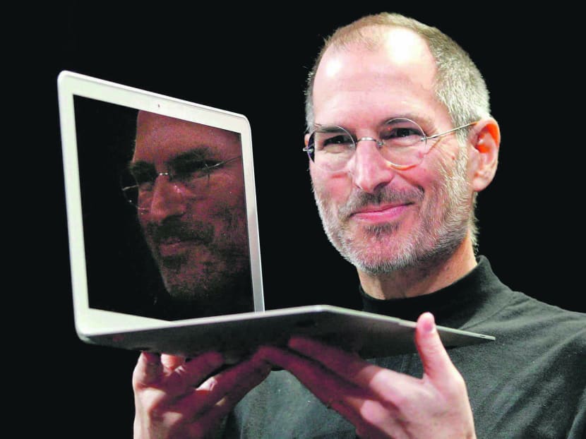 Steve Jobs holding up a MacBook Air in 2011. Photo: AP file photo