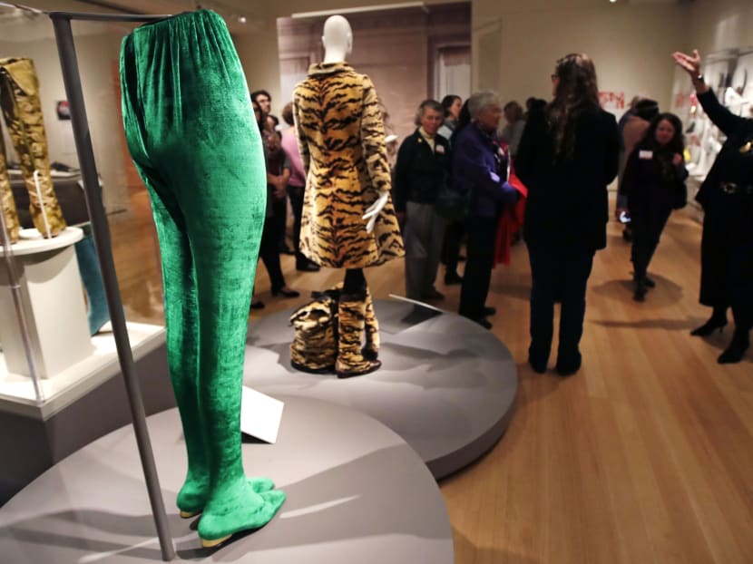 From flats to stilettos: Exhibit explores what shoes reveal