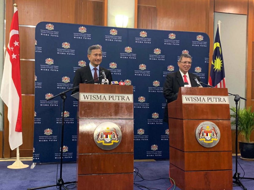 Singapore's Foreign Affairs Minister Vivian Balakrishnan and Malaysia's Foreign Affairs Minister Saifuddin Abdullah at a joint press conference in Putrajaya on Thursday, March 14, 2019.