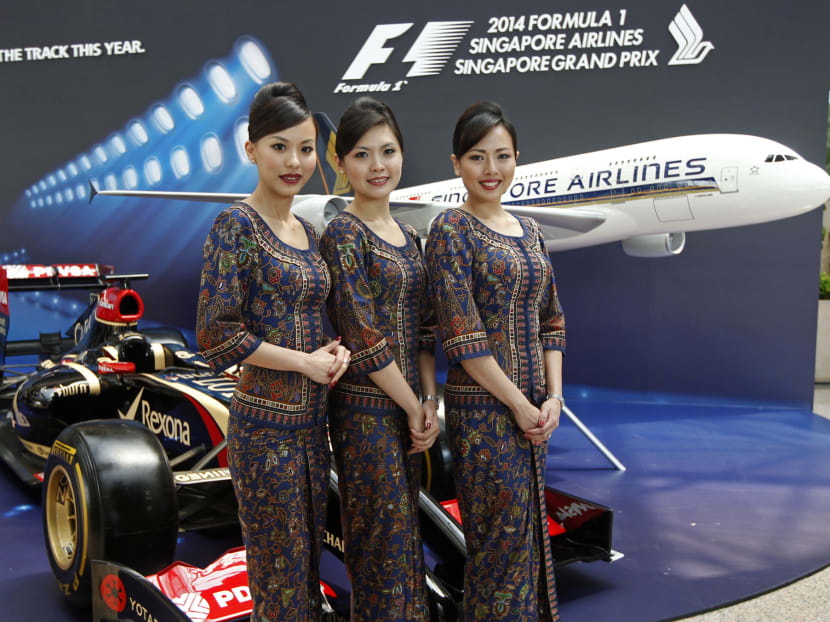 Singapore Airlines stewardesses posing during the announcement that Singapore Airlines will be the title sponsor of F1 Singapore Grand Prix, Apr 15, 2014. Photo: Wee Teck Hian