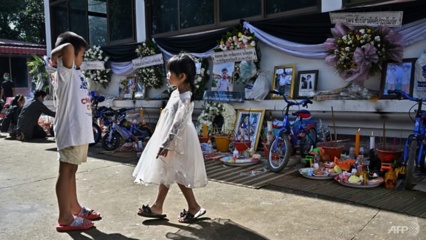 Families gather for mass cremation of Thai nursery victims Families gather for mass cremation of Thai nursery victims