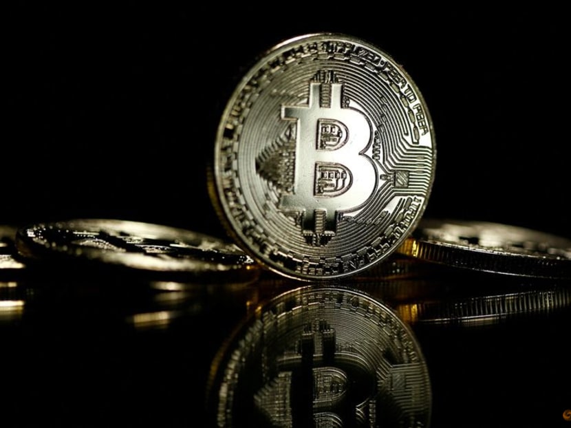 FILE PHOTO: Bitcoin are seen in this illustration picture taken September 27, 2017. REUTERS/Dado Ruvic/File Photo FILE PHOTO: Bitcoin are seen in this illustration picture taken September 27, 2017. REUTERS/Dado Ruvic/File Photo