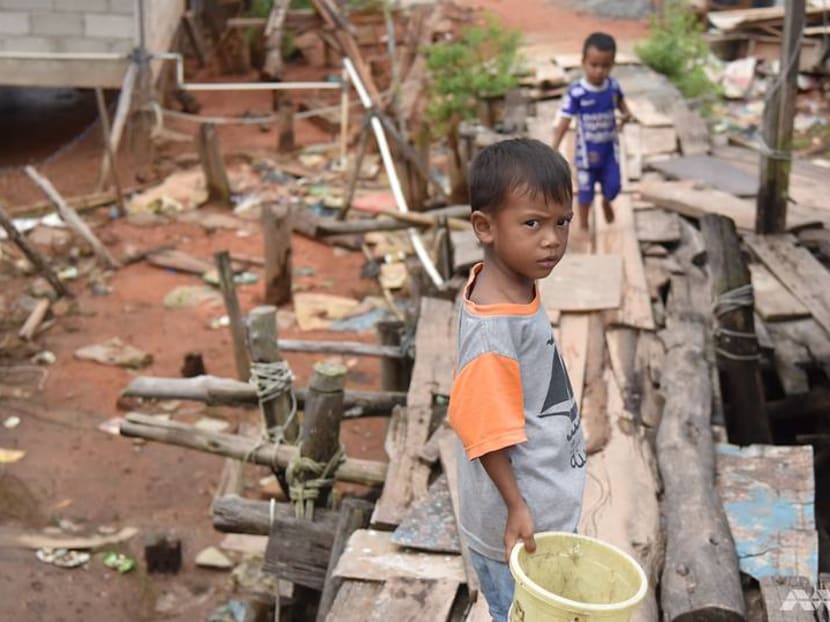 ‘My son dreamt of becoming a soldier’: COVID-19 takes a toll on Indonesian children