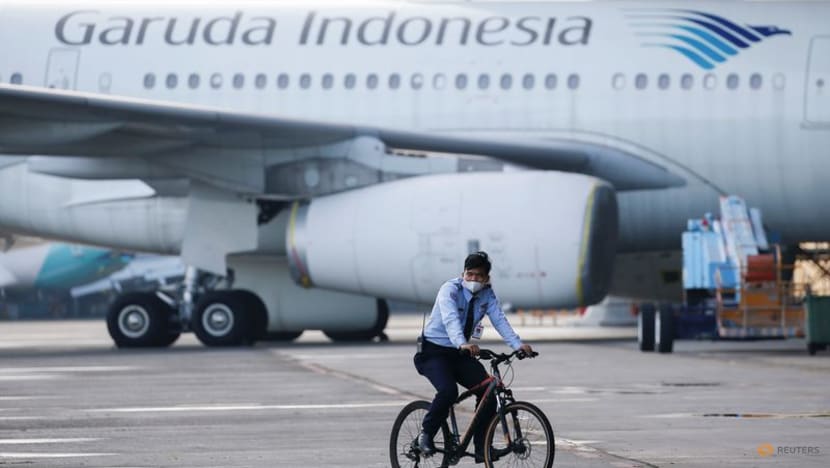 Garuda Indonesia halves debt with restructuring, on track for profit - government Garuda Indonesia halves debt with restructuring, on track for profit - government