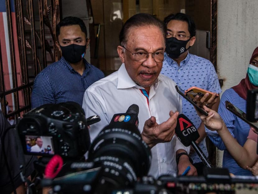 PKR president Anwar Ibrahim speaks to reporters after meeting with the Pakatan Harapan presidential council in Petaling Jaya on Jan 12, 2021.