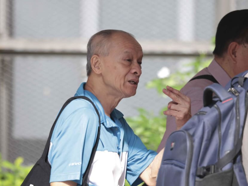 Lee Chook Lim gesturing as he was leaving the State Courts on May 6, 2024.