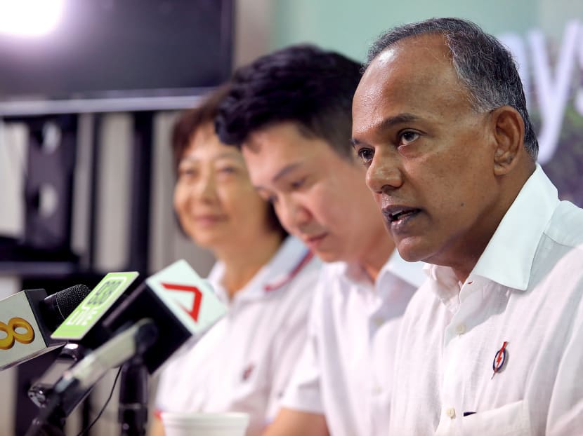 PAP Nee Soon GRC candidate K. Shanmugam (foreground) at the unveiling of the team's manifesto at Chong Pang's PAP Branch. Photo: Koh Mui Fong