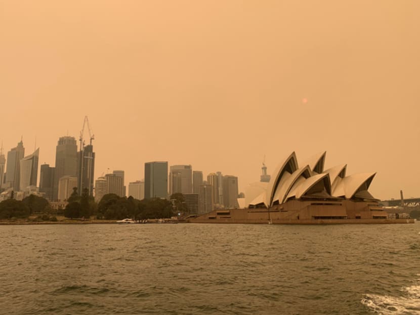 The haze from bushfires ringing Sydney obscures the sun setting above the Sydney Opera House in Sydney, Australia, Dec 6, 2019. The haze from bushfires ringing Sydney obscures the sun setting above the Sydney Opera House in Sydney, Australia, Dec 6, 2019.