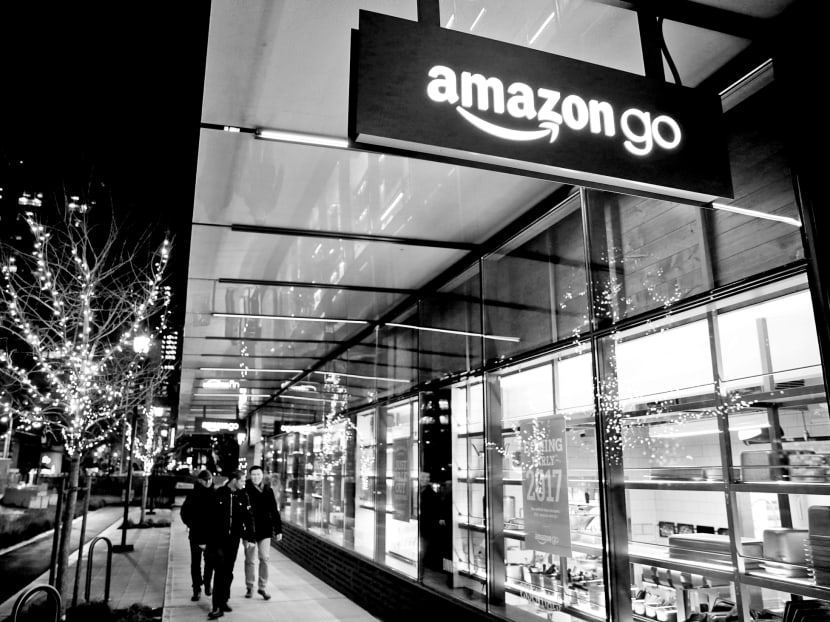Amazon Go uses AI systems to replace cashiers. While such technology can help to solve labour shortages, there are other possible negative repercussions that must be studied. Photo: Reuters