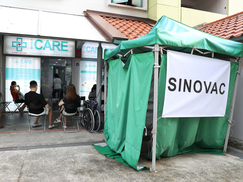 People waiting to get the Sinovac Covid-19 vaccine at iCare Medical and Wellness Clinic on June 18, 2021.