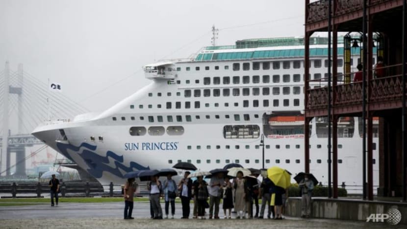 Cruise ship docks in Singapore after hundreds of passengers and crew members fall ill Cruise ship docks in Singapore after hundreds of passengers and crew members fall ill