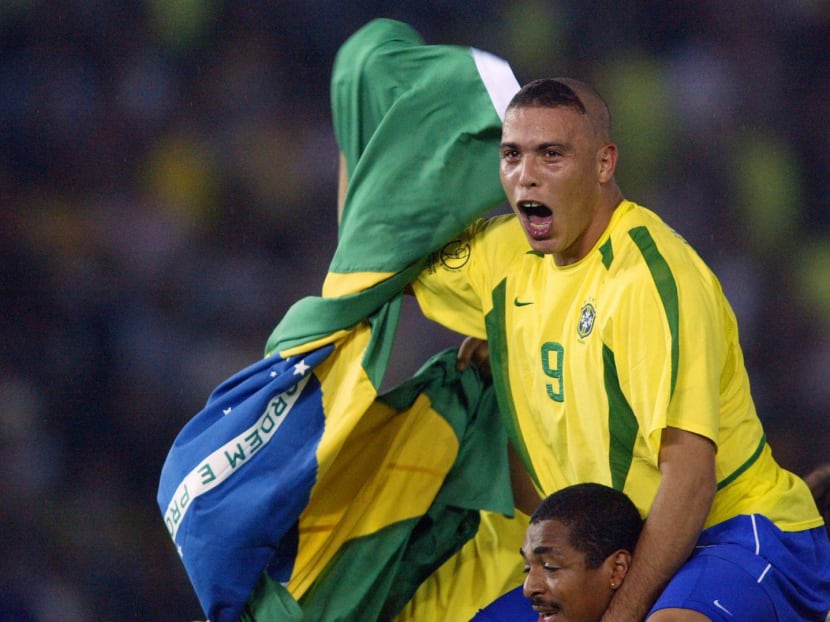 Brazil's forward Ronaldo celebrates, with tears in his eyes, after Brazil won 2-0 against Germany in match 64 of the 2002 FIFA World Cup Korea Japan final at the International Stadium Yokohama, Japan on June 30, 2002.
