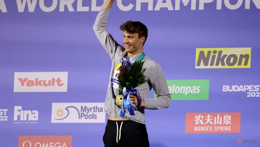 Hungary's Milak smashes own swimming world record, triple gold for US Hungary's Milak smashes own swimming world record, triple gold for US