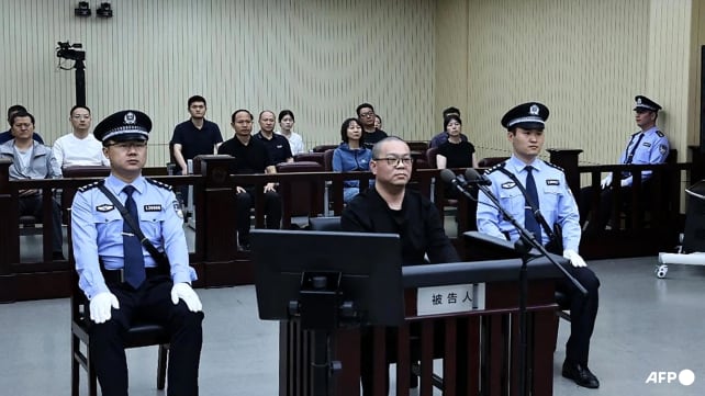 China sentences former asset manager to death for 'extremely large' bribes