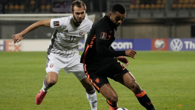 Netherlands win away in Latvia to stay ahead in World Cup qualifying group Netherlands win away in Latvia to stay ahead in World Cup qualifying group