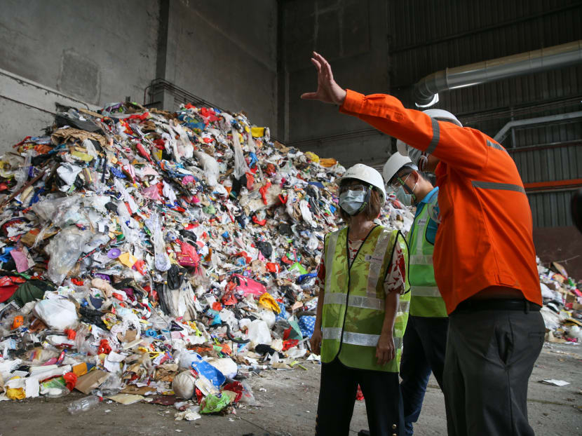 Photo of the day: Senior Minister of State for the Environment and Water Resources Amy Khor tours the SembWaste Materials Recovery Facility on Tuesday, Jan 22.