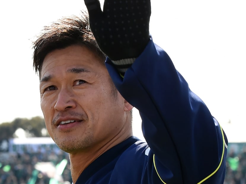 Miura, who plays for J-League second division club Yokohama, appeared in a professional match at the age of 50 years and 7 days to beat former England international Stanley Matthews' longevity record. Photo: AP