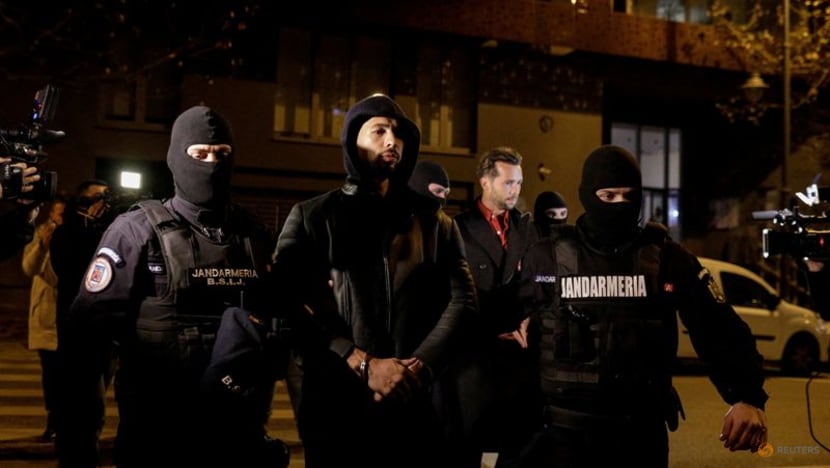 Romania detains ex-kickboxer Andrew Tate in human trafficking case Romania detains ex-kickboxer Andrew Tate in human trafficking case