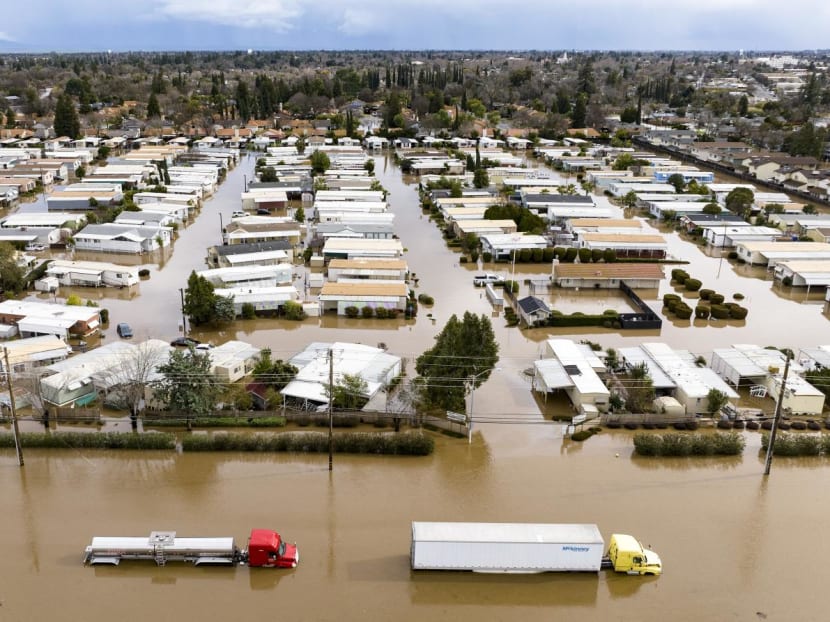 This aerial view shows a flooded neighborhood in Merced, California on Jan 10, 2023. This aerial view shows a flooded neighborhood in Merced, California on Jan 10, 2023.
