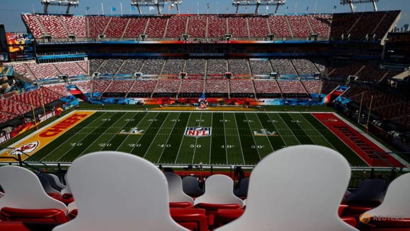 Mask-clad fans stream into Buccaneers' home stadium for Super Bowl unlike any other Mask-clad fans stream into Buccaneers' home stadium for Super Bowl unlike any other
