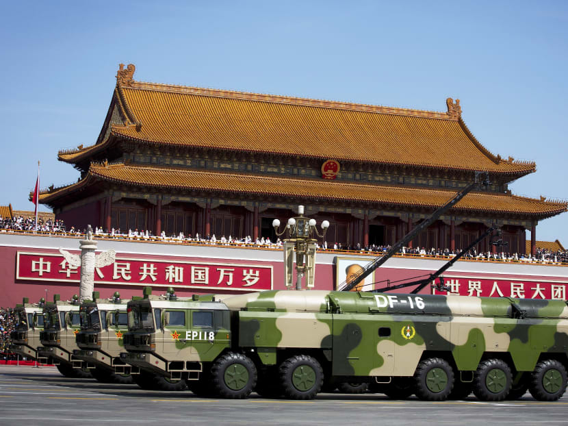 Chinese military vehicles debuting DF-16 ballistic missiles at Tiananmen Gate in Beijing during a 2015 military parade. The medium-range missile, capable of threatening United  States and Japanese bases in Asia with a strike range of more than 1,000km, has made its third public appearance at recent Rocket Force drills over the Chinese New Year holiday. Photo: AP