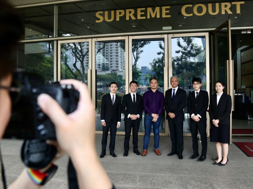 Mr Bryan Choong (third from left) seen outside the Supreme Court posing for a photo with his lawyers on Nov 13, 2019. He is one of three men who have mounted challenges to Section 377A of the Penal Code.
