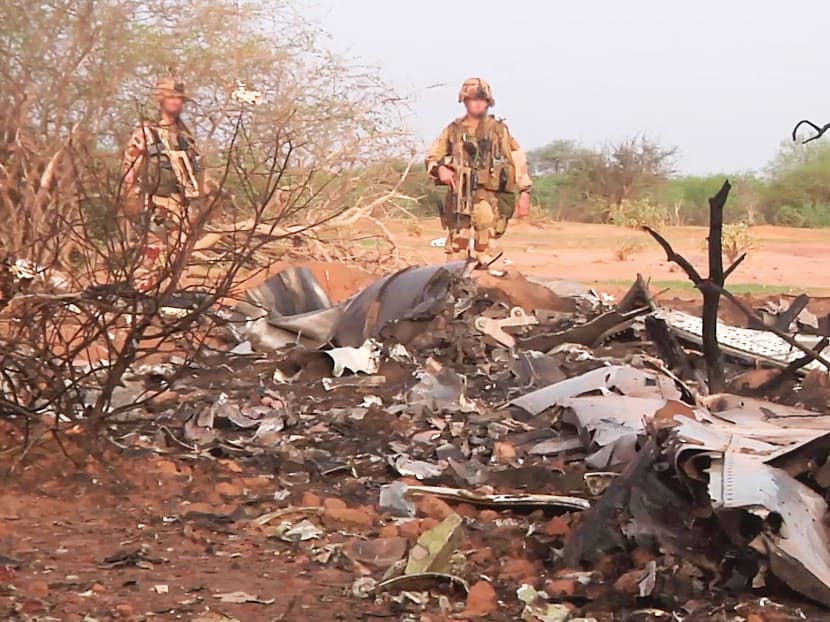 One of two black boxes was recovered from the wreckage in the Gossi region of Mali near the border with Burkina Faso and taken to the northern city of Gao where a French contingent is based. 
Photo: Reuters