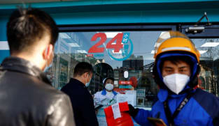 Residents in China rush to stock up antigen kits, medicines as COVID-19 prevention curbs ease