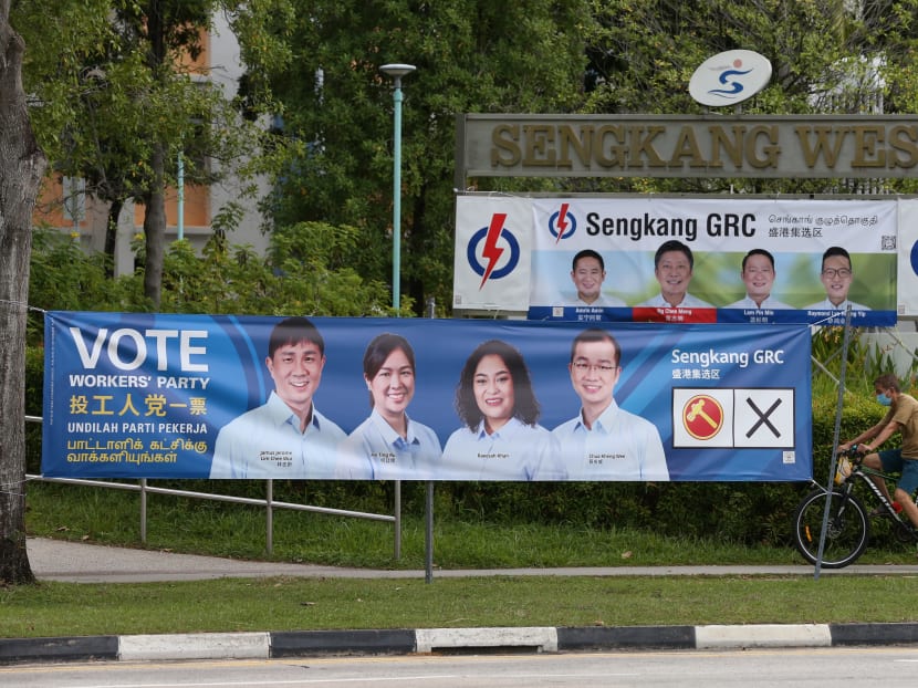 Campaign banners of the Workers' Party and the People's Action Party along Sengkang East Road in July 2020. Ms Raeesah Khan was one of four candidates contesting with the Workers' Party at the last General Election then.