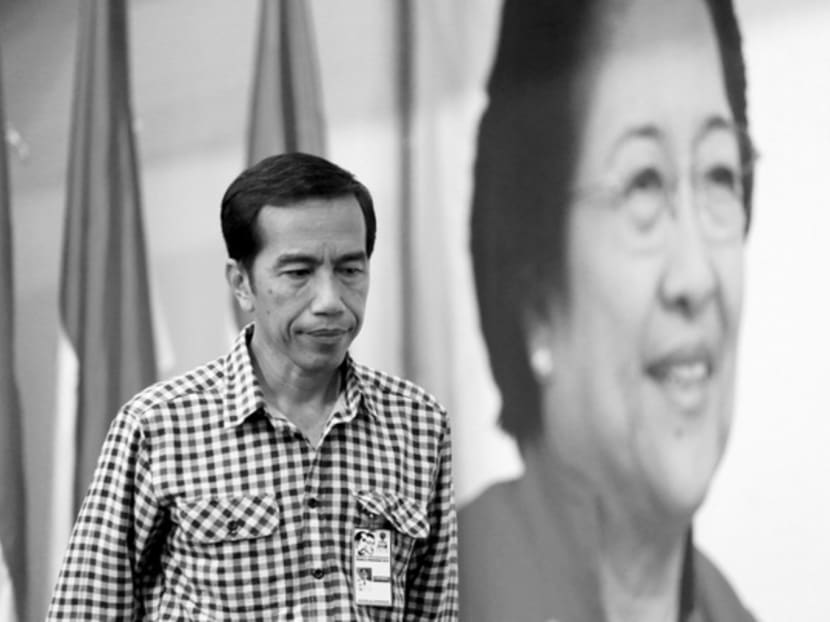 Since his inauguration, Mr Widodo has had to contend with pressure from his political party and its chairperson, Ms Megawati Sukarnoputri. Photo: REUTERS