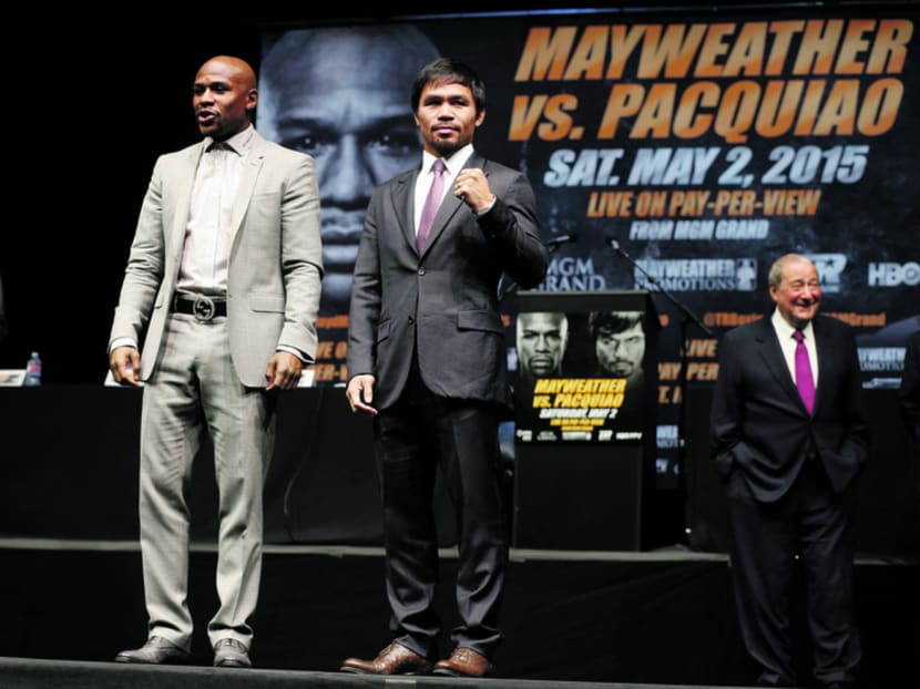 The fight between Mayweather (left) and Pacquiao will be televised by HBO and Showtime. Photo: Reuters