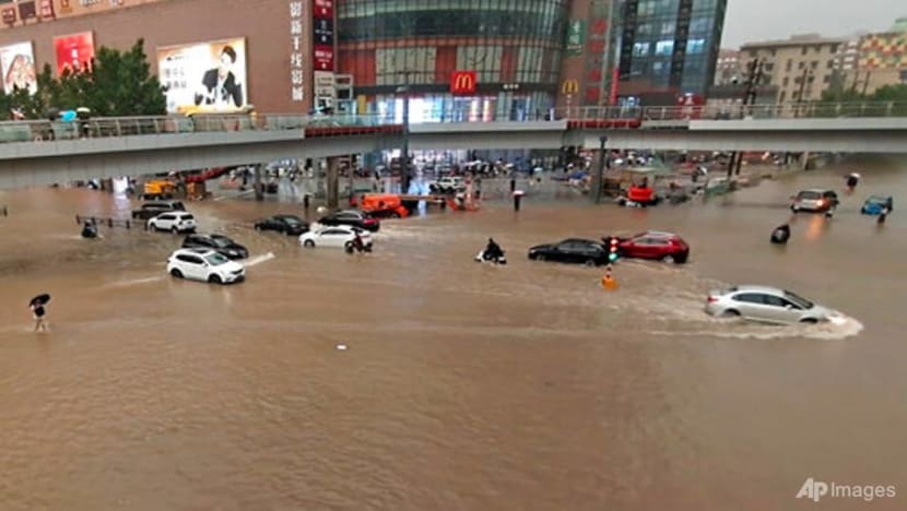 A dozen cities in China's Henan province flooded as river banks burst