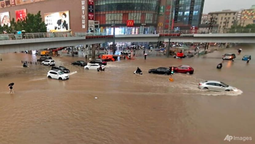 A dozen cities in China's Henan province flooded as river banks burst A dozen cities in China's Henan province flooded as river banks burst