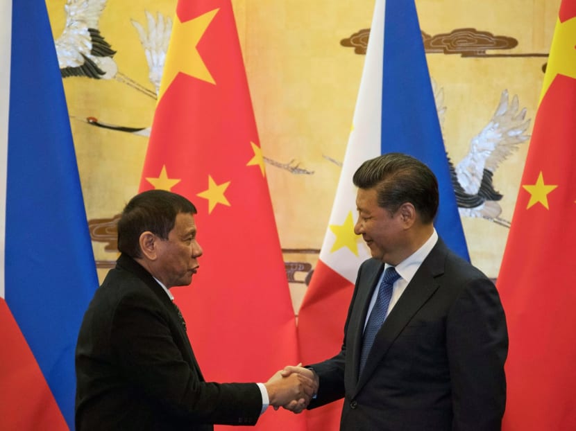 Philippines President Rodrigo Duterte meeting Chinese President Xi Jinping in Beijing in Oct 2016.  During the visit, Mr Duterte told Mr Xi that “this is the springtime of our relationship” and returned home with US$15 billion-worth of investment pledges. Photo: Reuters