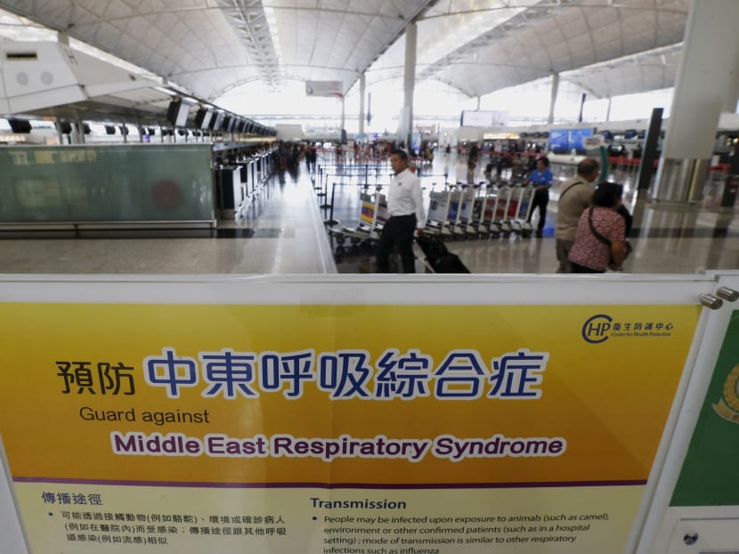A sign telling passengers to guard against Middle East Respiratory Syndrome (MERS) is displayed at the departure hall of Hong Kong Airport in Hong Kong, China, June 9, 2015. Photo: Reuters