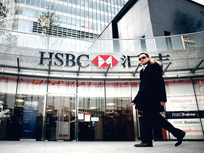 The HSBC headquarters building in the Pudong financial district in Shanghai. Foreign banks have long complained 
about regulations fettering their growth in China. PHOTO: REUTERS