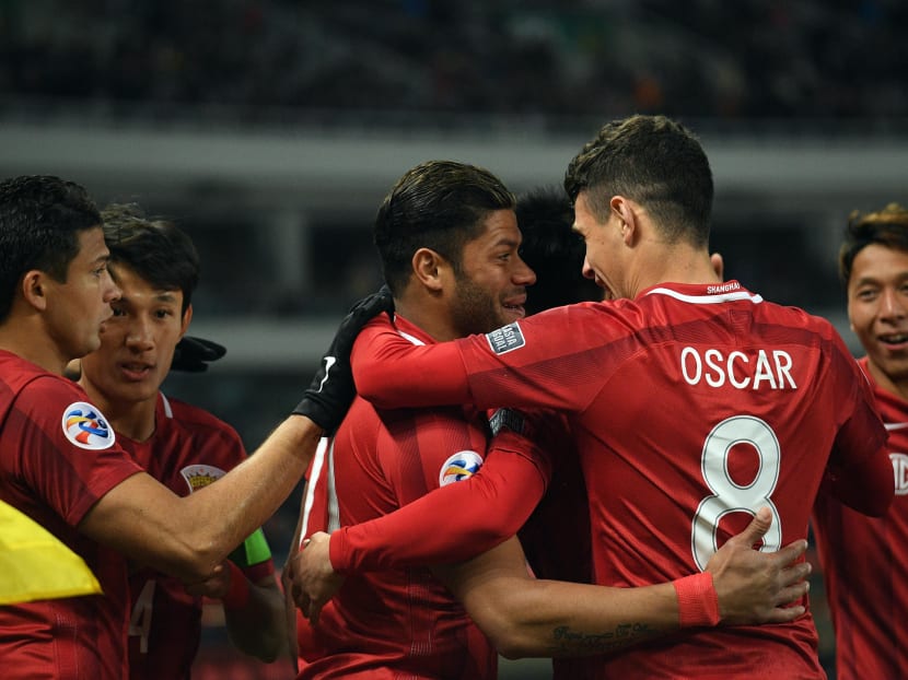 Over the past year, transfers like Shanghai SIPG’s deals for the Brazilian duo Oscar and Hulk - who cost €60 million (S$93 million) each - have brought a wave of attention to the Chinese league. Photo: AFP